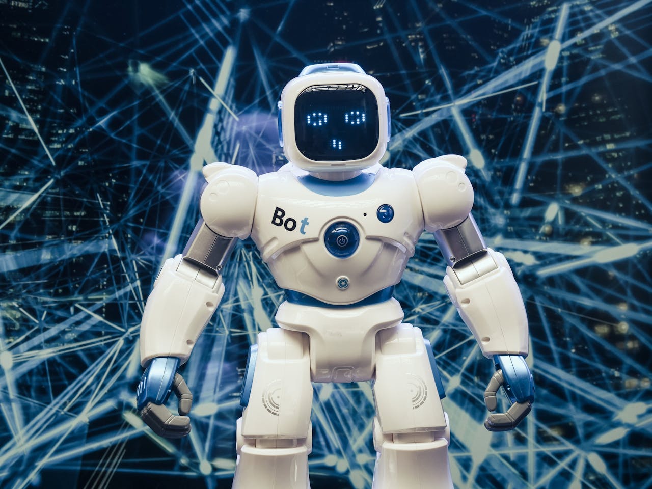 about-02 A modern humanoid robot with luminous features set against a digital network backdrop.